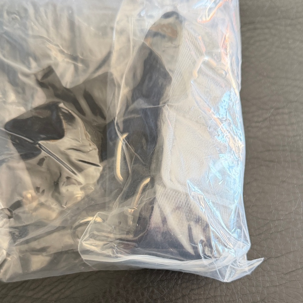 Black and White Item in Packaging